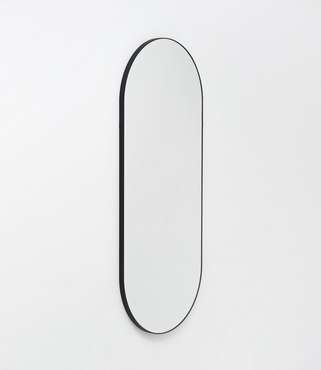 Настенное овальное зеркало Delatta 47х110 в ремне из натуральной кожи 