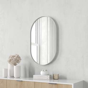 Дизайнерское настенное зеркало Nolvis S в тонкой металлической раме белого цвета