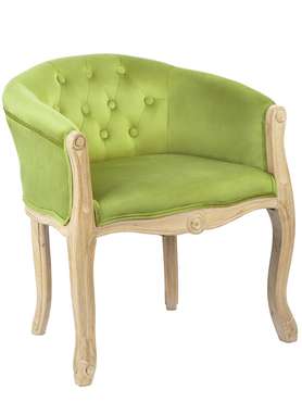 Кресло в обивке из велюра зеленого цвета