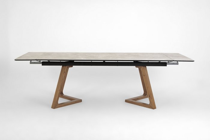 Раздвижной обеденный стол Стелс светло-серого цвета - купить Обеденные столы по цене 165200.0