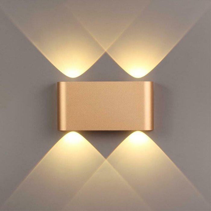Настенный светодиодный светильникMagnum золотого цвета - лучшие Бра и настенные светильники в INMYROOM