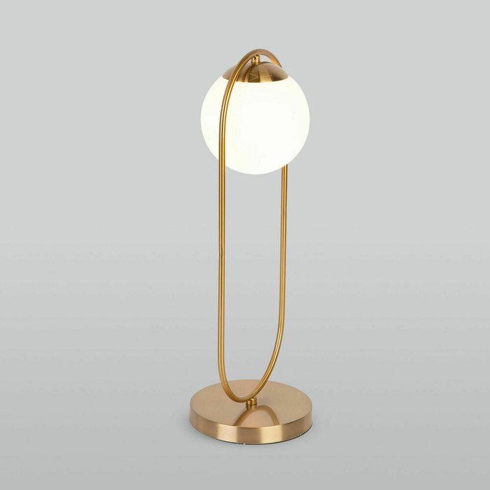 Настольная лампа Ringo золотого цвета - купить Настольные лампы по цене 9650.0