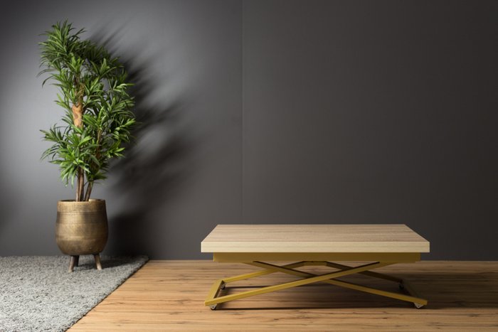 Стол трансформер Compact цвета дуб сонома на золотых опорах - лучшие Обеденные столы в INMYROOM