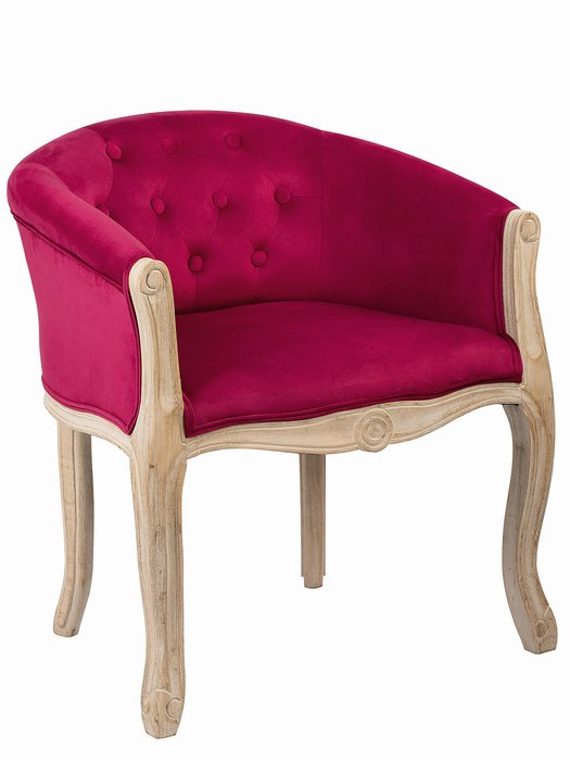 Кресло в обивке из велюра розового цвета