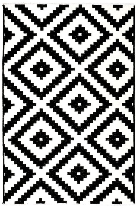 Двусторонний ковер  черно-белого цвета 125x180