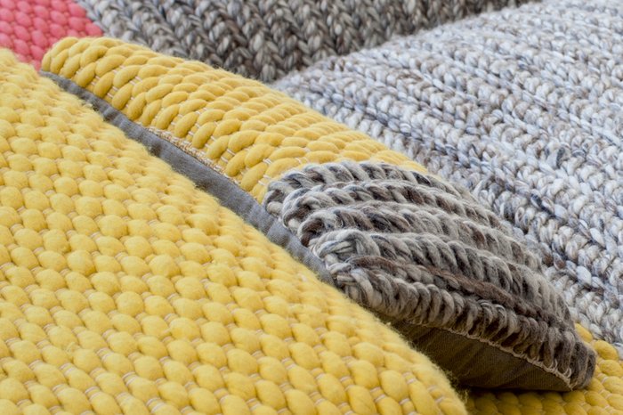 Подушка Plait Yellow серо-желтого цвета - купить Декоративные подушки по цене 13990.0