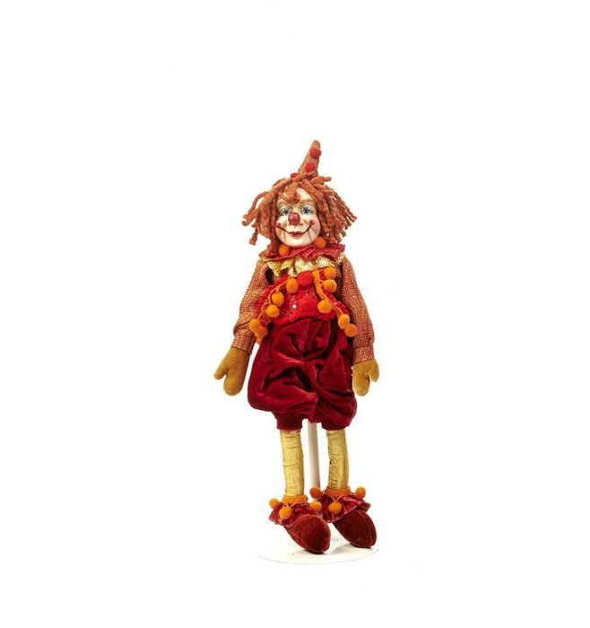 Цирковой клоун в красных панталонах