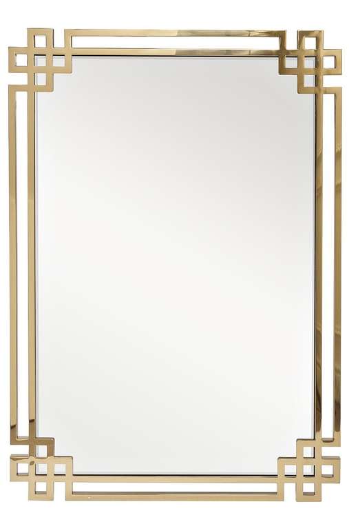 Настенное зеркало в металлической раме золотого цвета