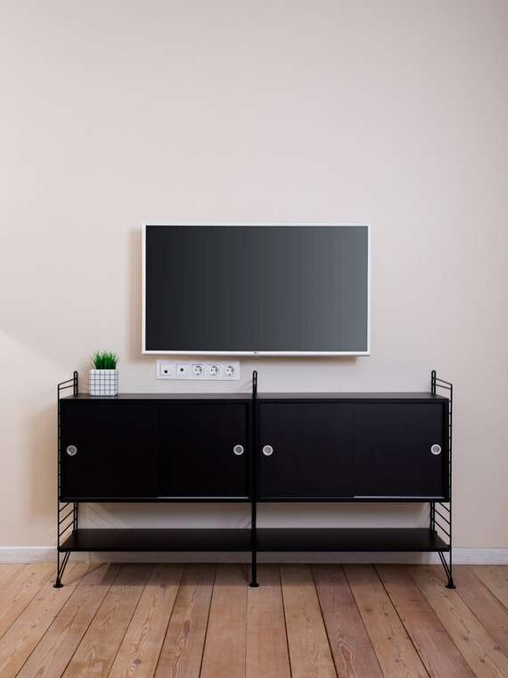 Тумба под телевизор черного цвета