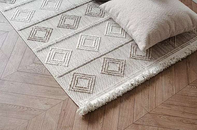 Ковер Bohem Ash 100x200 бежевого цвета