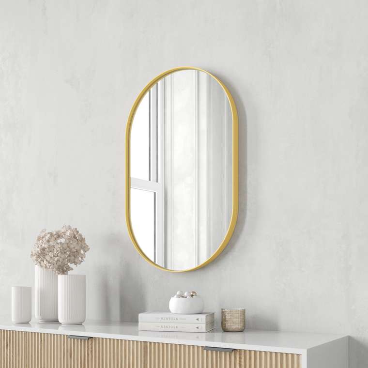 Дизайнерское настенное зеркало Nolvis S в тонкой металлической раме золотого цвета