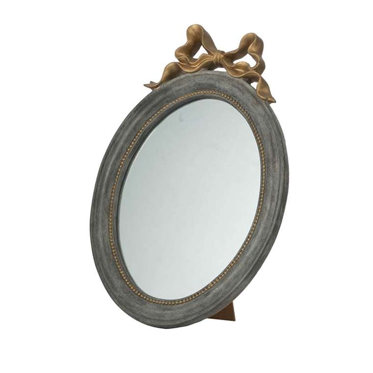 Настенное зеркало в раме серого цвета 