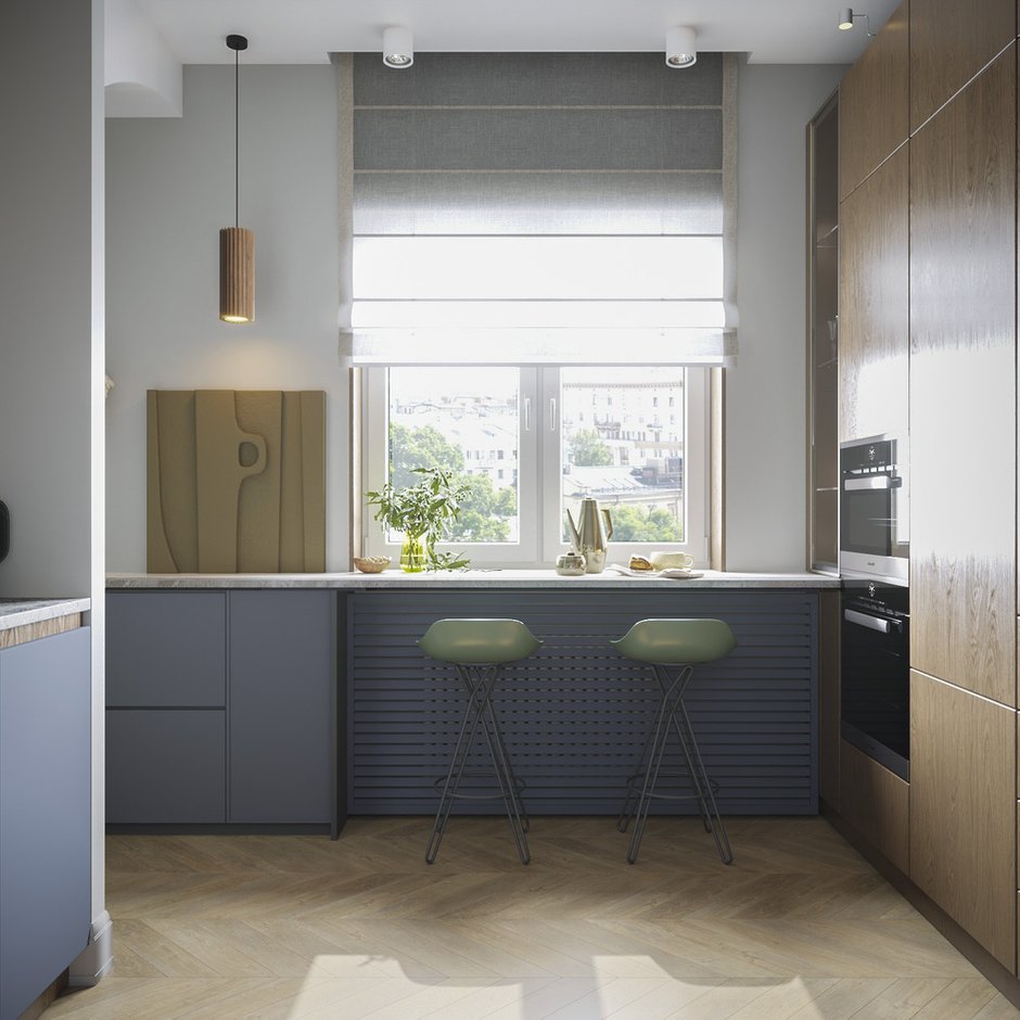 Радиатор отопления под барной стойкой скрыли за красивой панелью в цвет кухонного гарнитура.