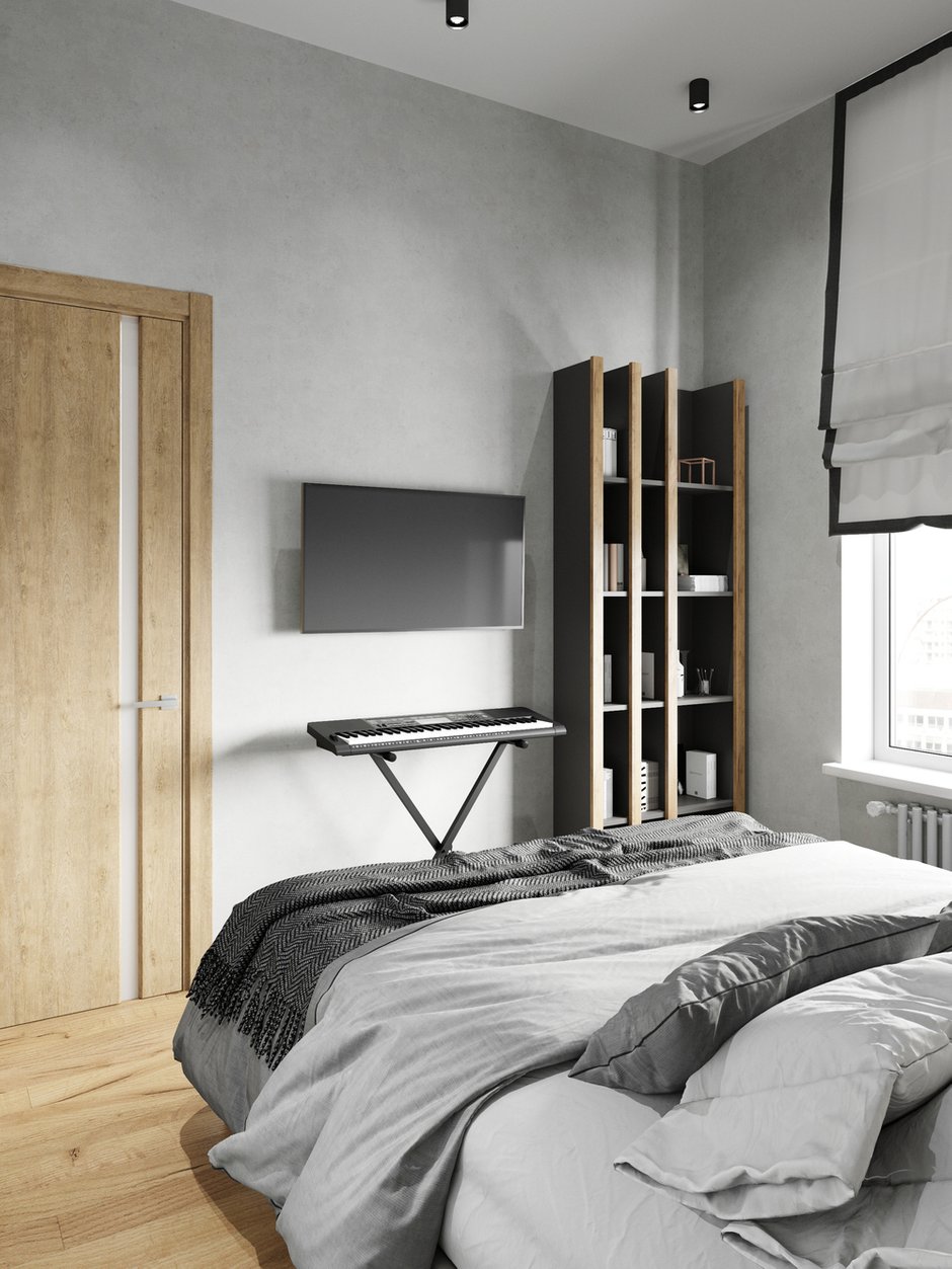 Цветовая палитра объекта мужская, сдержанная, довольно суровая: состоит из черного, темно-синего, белого и оттенков натурального дерева.