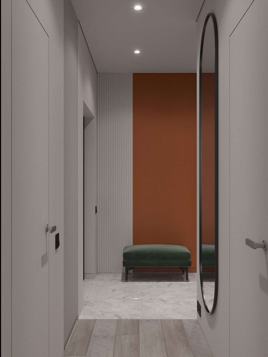 В прихожей также используются яркая покраска и практичные антивандальные панели. Для пола выбрали керамогранит, за которым легко ухаживать.