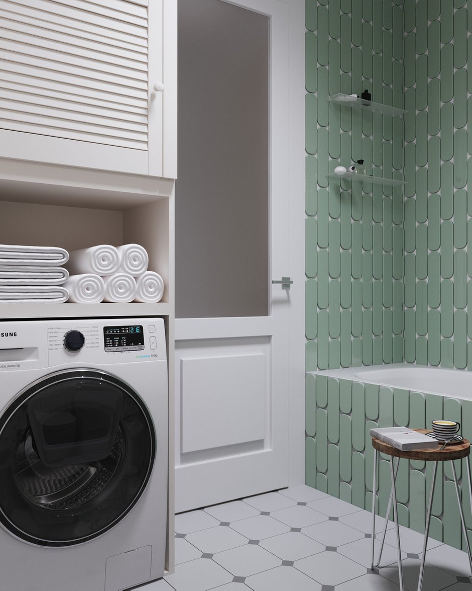 В ванной корзина для белья задвигается под раковину, а основная система хранения организована над стиральной машиной.