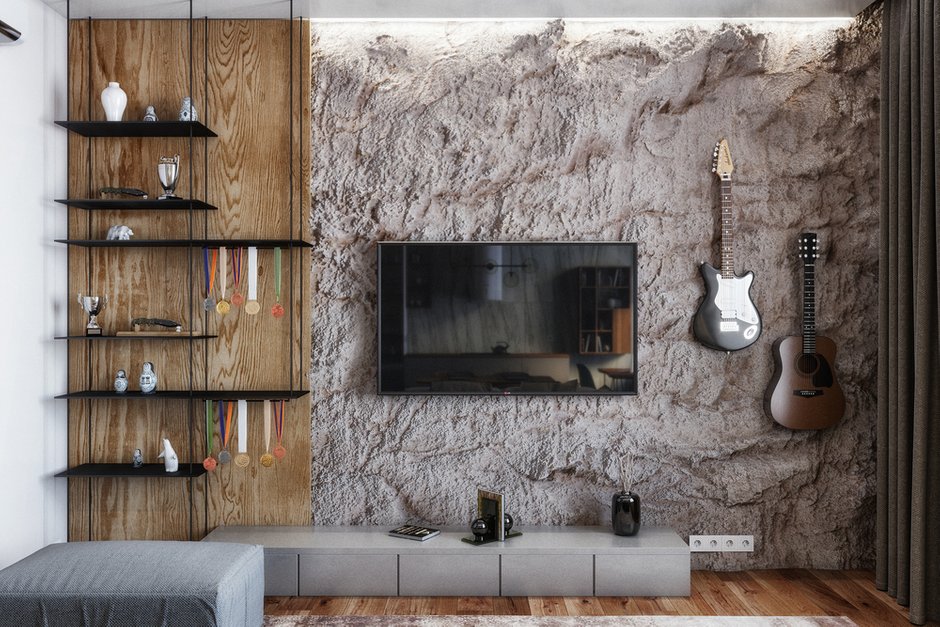 В зоне ТВ организовали место под памятные атрибуты и награды с гонок, а также место для гитар.