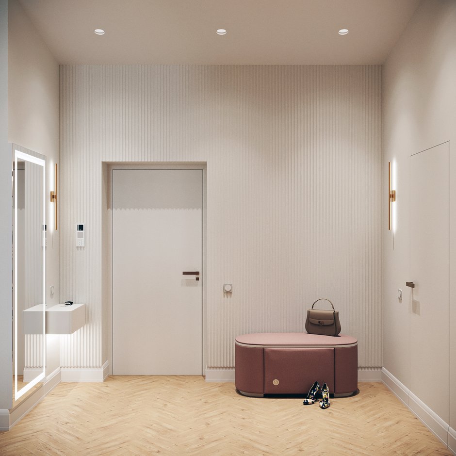 Для отделки одной из стен прихожей использовали рельефные гипсовые панели. Они добавляют динамики.