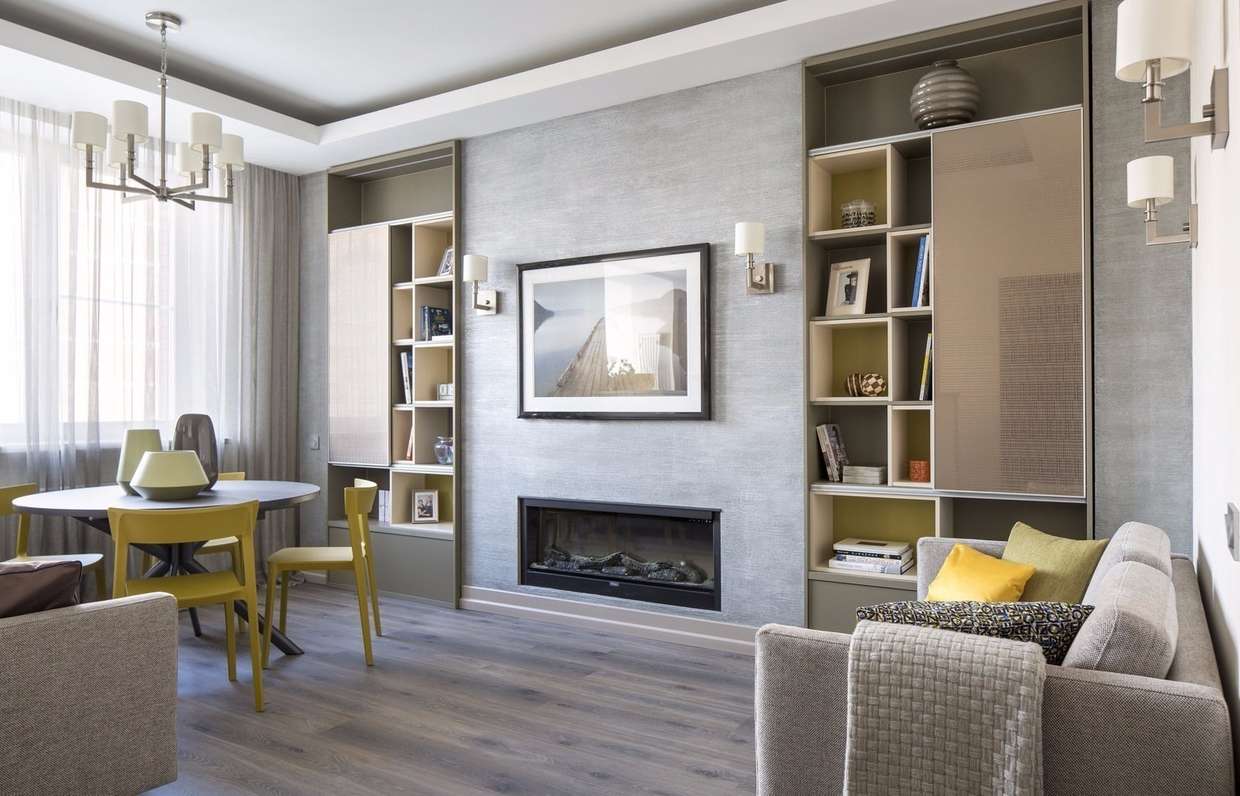 Современные стенки в гостиную : красивые угловые и мини модели в зал в современом стиле, белые и черные в стильном интерьере